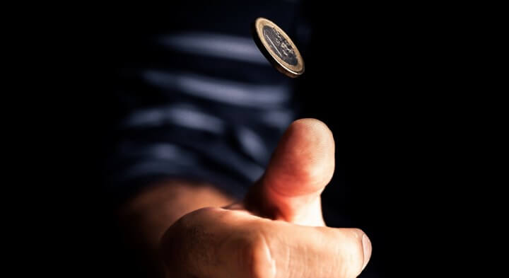 Flipping a coin.